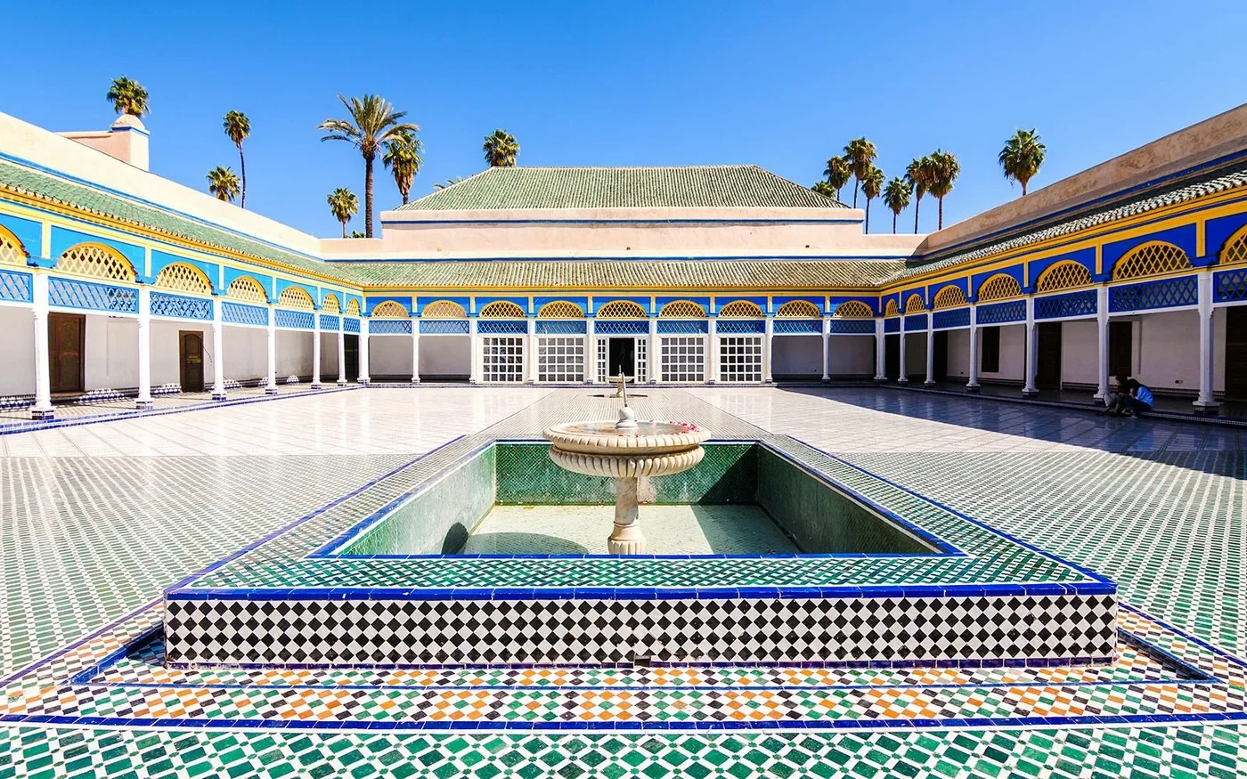 Colourful tiled courtyard and central fountain at Bahia Palace